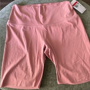 Nike Yoga Shorts in Pink size L